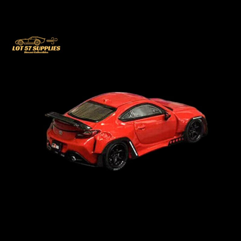 Red Toyota GR86 diecast model with Rocket Bunny Pandem body kit, 1:64 scale, featuring detailed exterior design.