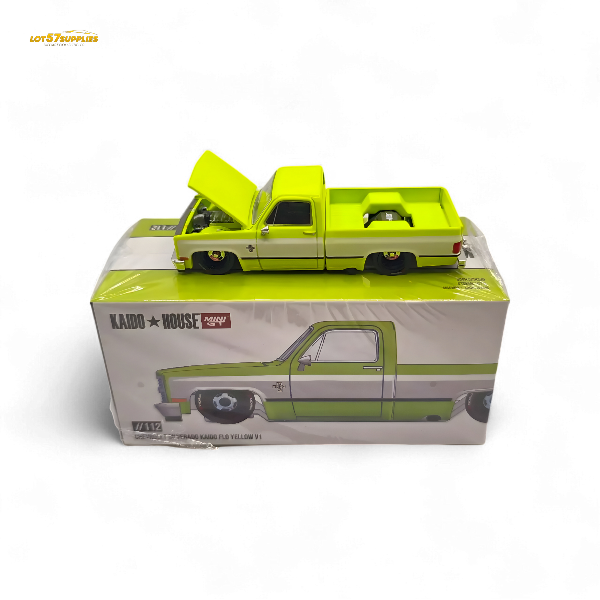 Mini GT x Kaido House Chevrolet Silverado FLO YELLOW diecast model in 1:64 scale, yellow Chevrolet pickup truck with detailed features.
