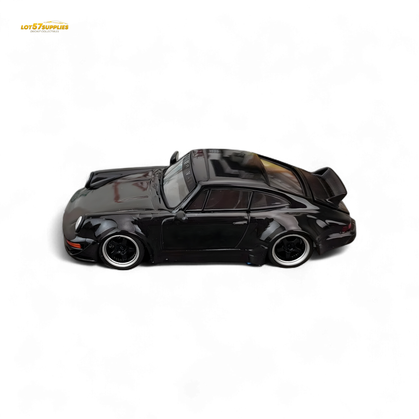 Gloss black Porsche 964 RWB Ducktail diecast car model in 1:64 scale, showcasing detailed exterior and sleek design.