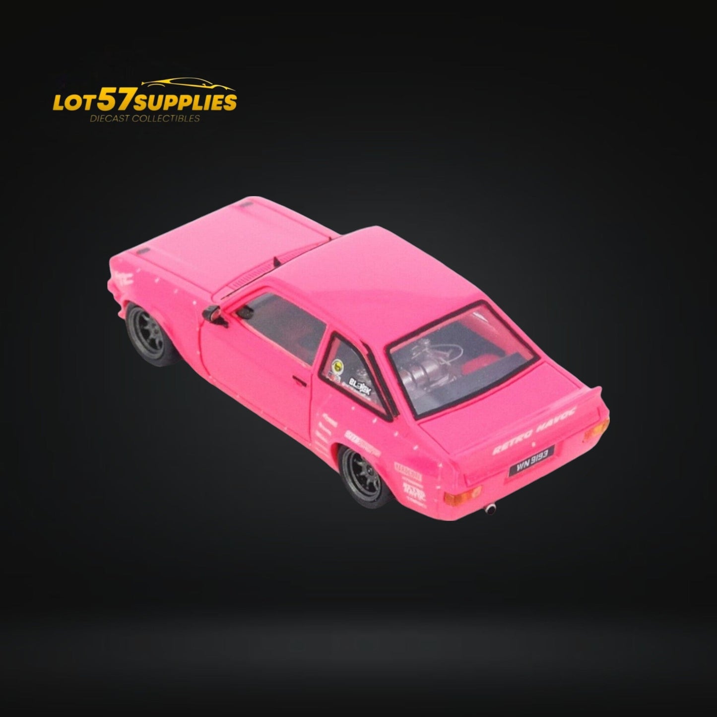 1:64 scale Inno64 Ford Escort MK2 Pandem "Emotion" diecast model in pink, featuring detailed retro design and sporty styling.
