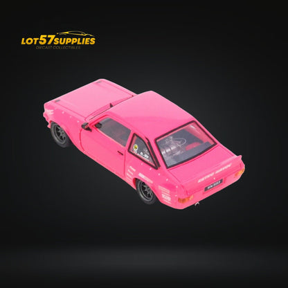 1:64 scale Inno64 Ford Escort MK2 Pandem "Emotion" diecast model in pink, featuring detailed retro design and sporty styling.