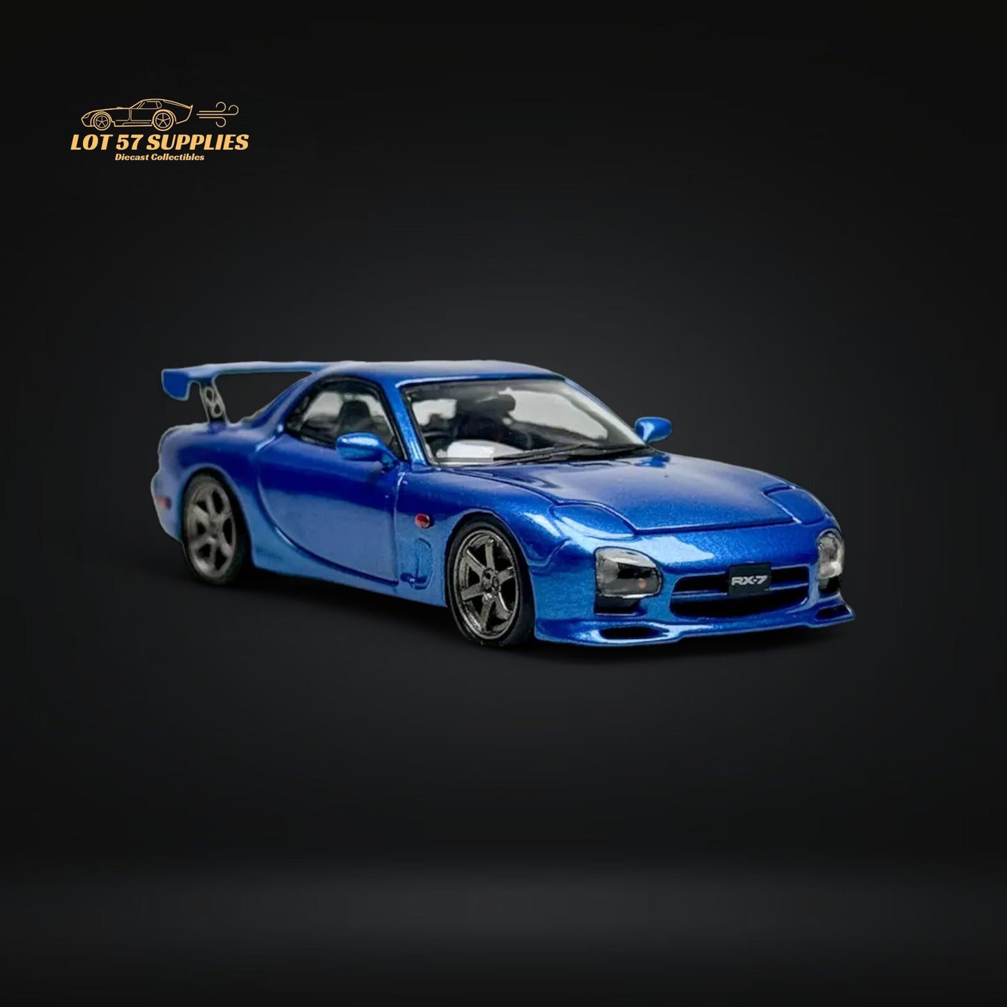 Metallic blue PGM Mazda RX-7 FD3S diecast model car in 1:64 scale by Lot57Supplies Diecast Shop, detailed exterior, close-up view