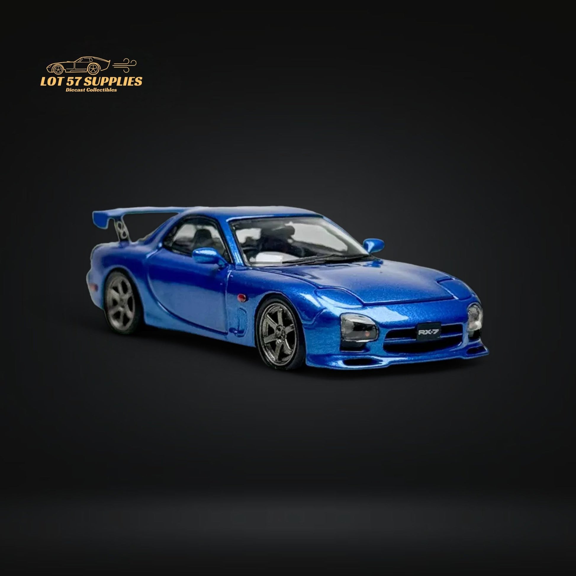 Metallic blue PGM Mazda RX-7 FD3S diecast model car in 1:64 scale by Lot57Supplies Diecast Shop, detailed exterior, close-up view