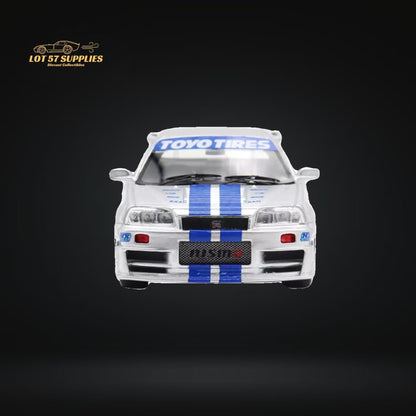Silver blue Nissan Skyline R34 diecast model with F&F livery, 1:64 scale, by Lot57Supplies Diecast Shop.