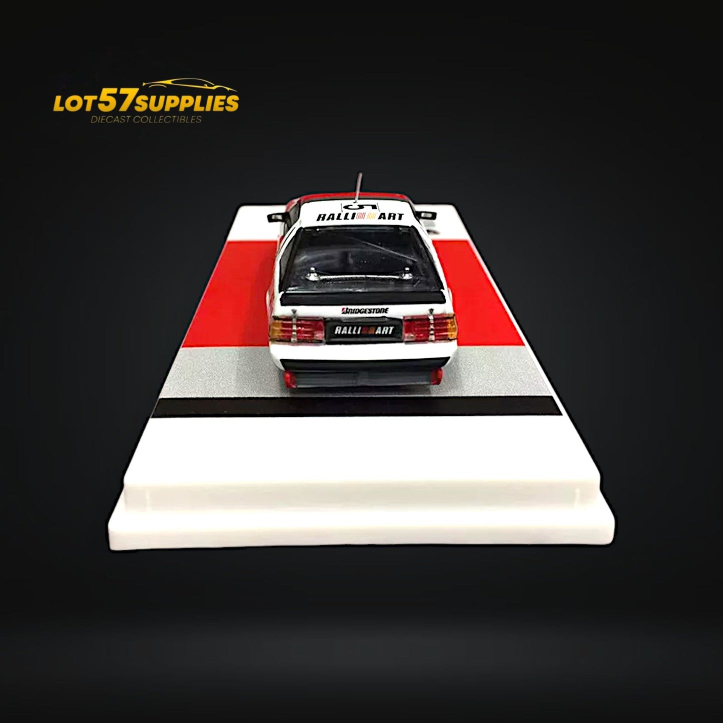 Detailed image of a 1:64 scale Mitsubishi Starion Macau Guia Race 1988 #5 diecast model by Tarmac Works.