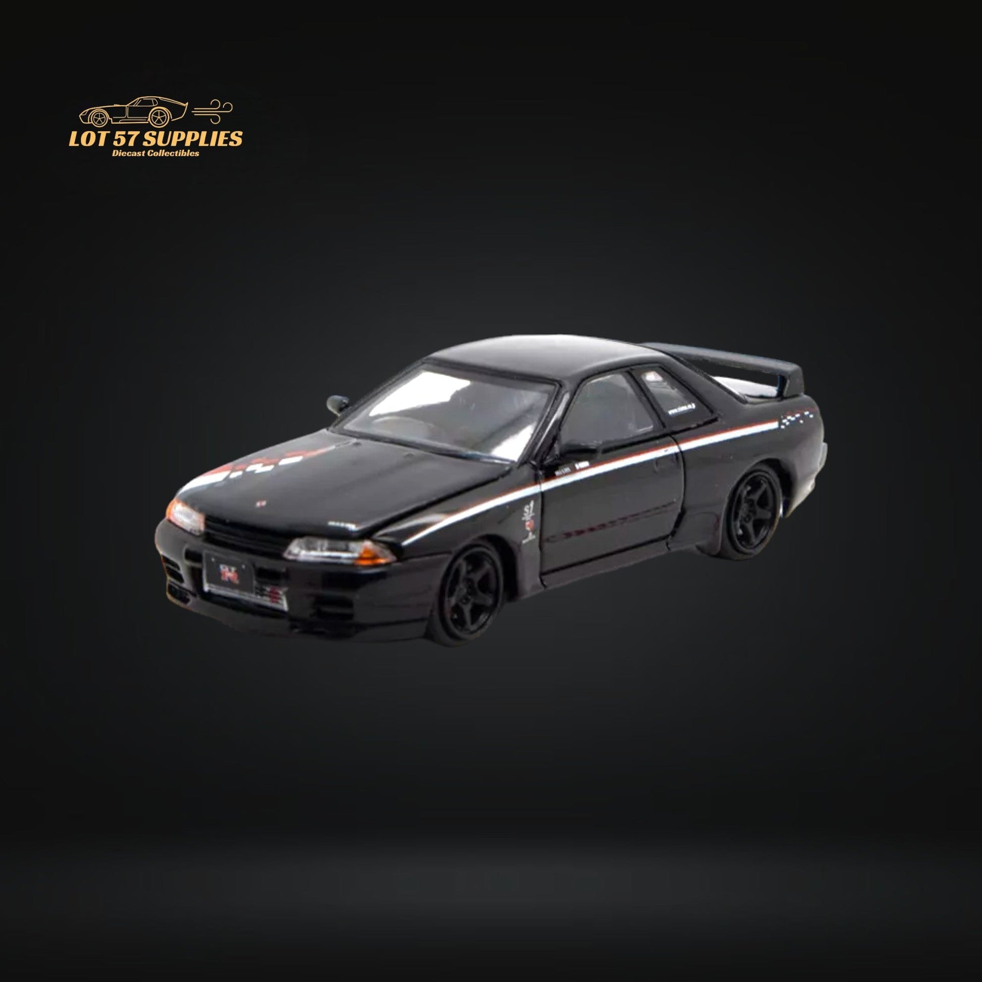 Nissan Skyline R32 GT-R Nismo S-Tune diecast model car in 1:64 scale by Lot57Supplies, detailed silver and black exterior.