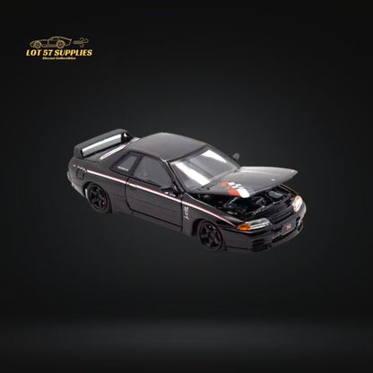 Nissan Skyline R32 GT-R Nismo S-Tune diecast car by Lot57Supplies, 1:64 scale, detailed blue model with racing decals.
