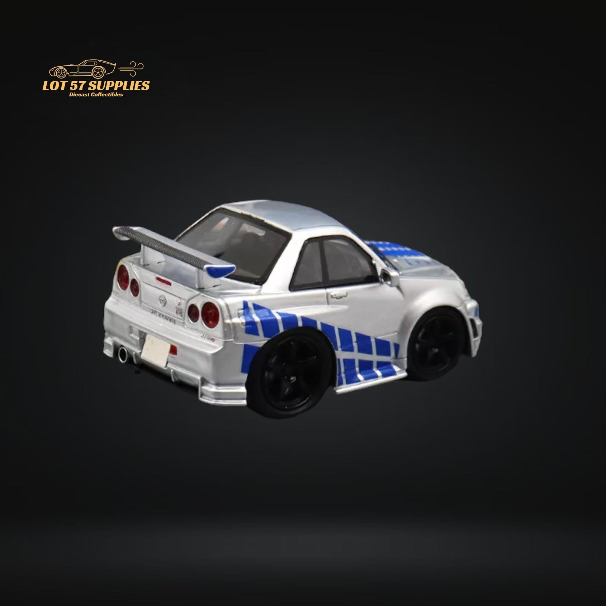 Silver blue Nissan Skyline R34 diecast model with F&F livery, detailed 1:64 scale car from Lot57Supplies Diecast Shop