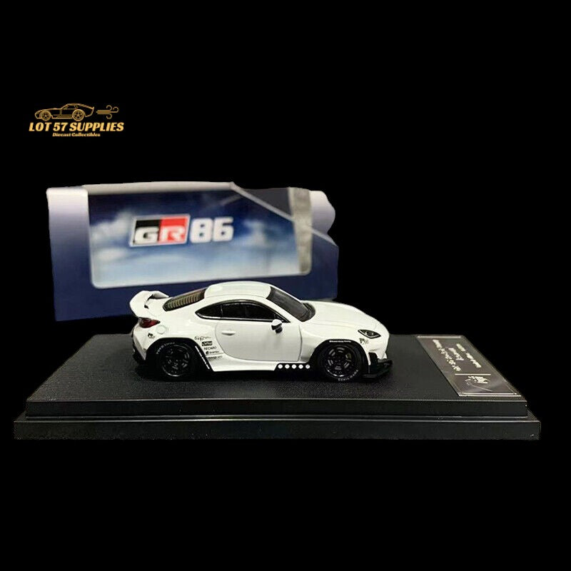 White 1:64 scale Toyota GR86 diecast model with Rocket Bunny Pandem kit by Lot57Supplies Diecast Shop, detailed and collectible.