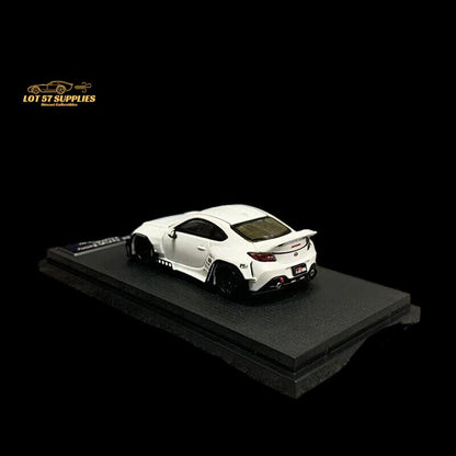 White 1:64 scale Toyota GR86 diecast model with Rocket Bunny Pandem kit by Lot57Supplies Diecast Shop.