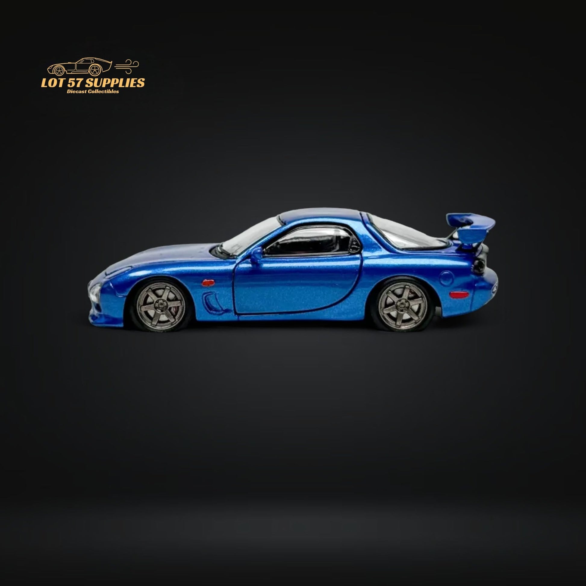 Metallic blue Mazda RX-7 FD3S diecast model in 1:64 scale from Lot57Supplies, detailed miniature car with realistic features.