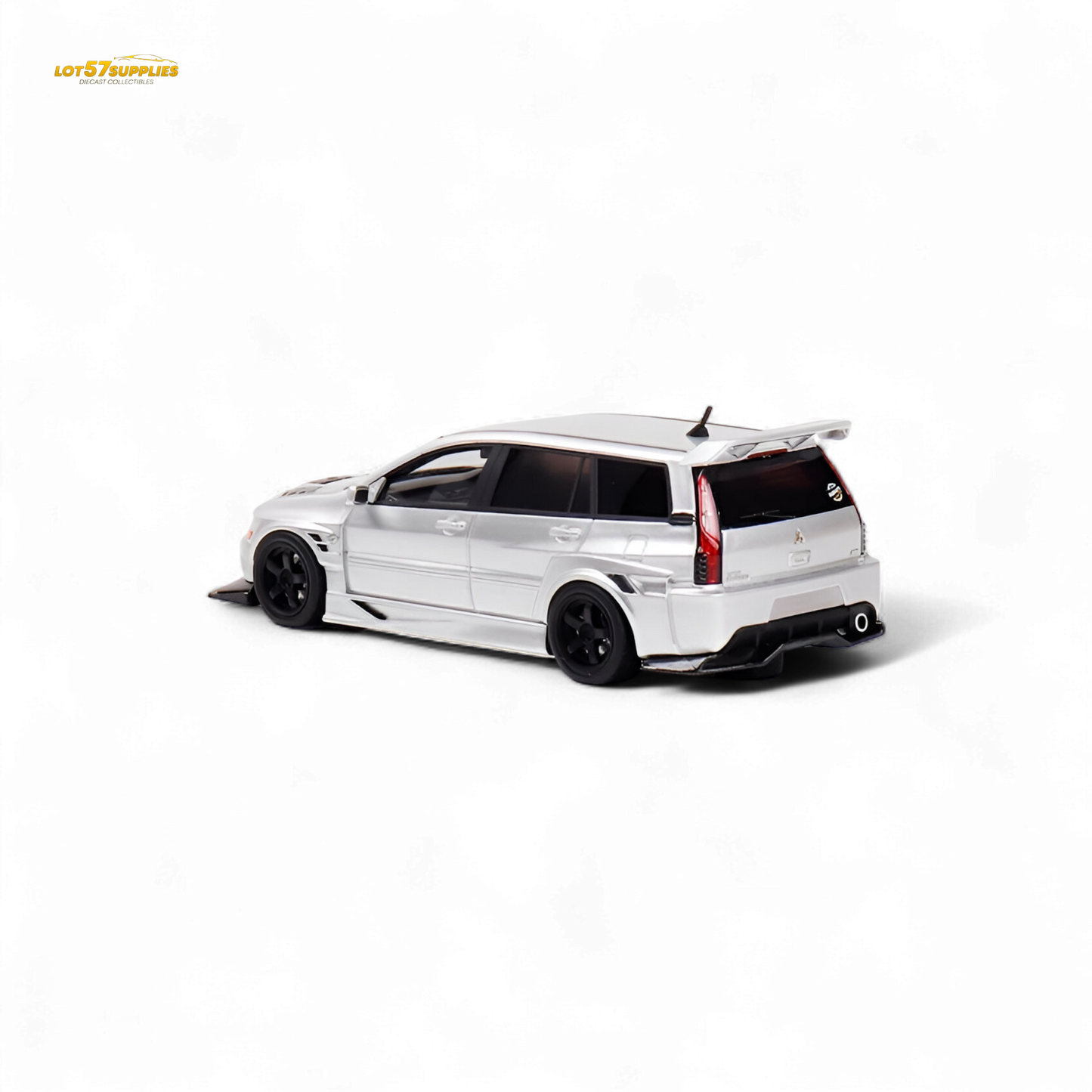 Glossy silver Mitsubishi Lancer EVO 9 Wagon diecast model in 1:64 scale, featuring detailed exterior and realistic design.