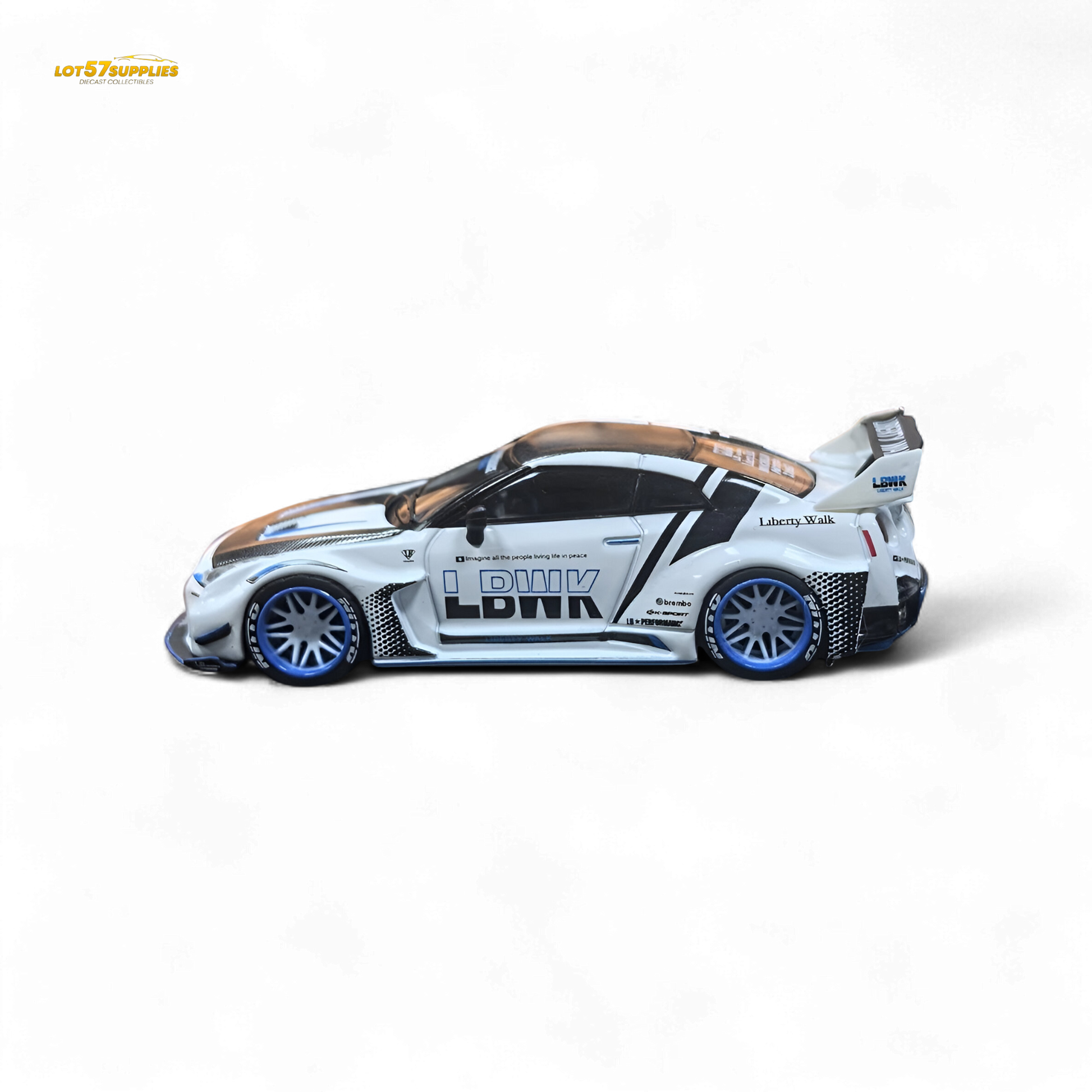 White and blue stripe Nissan GTR R35 diecast model with carbon roof, 1:64 scale from Lot57Supplies Diecast Shop.