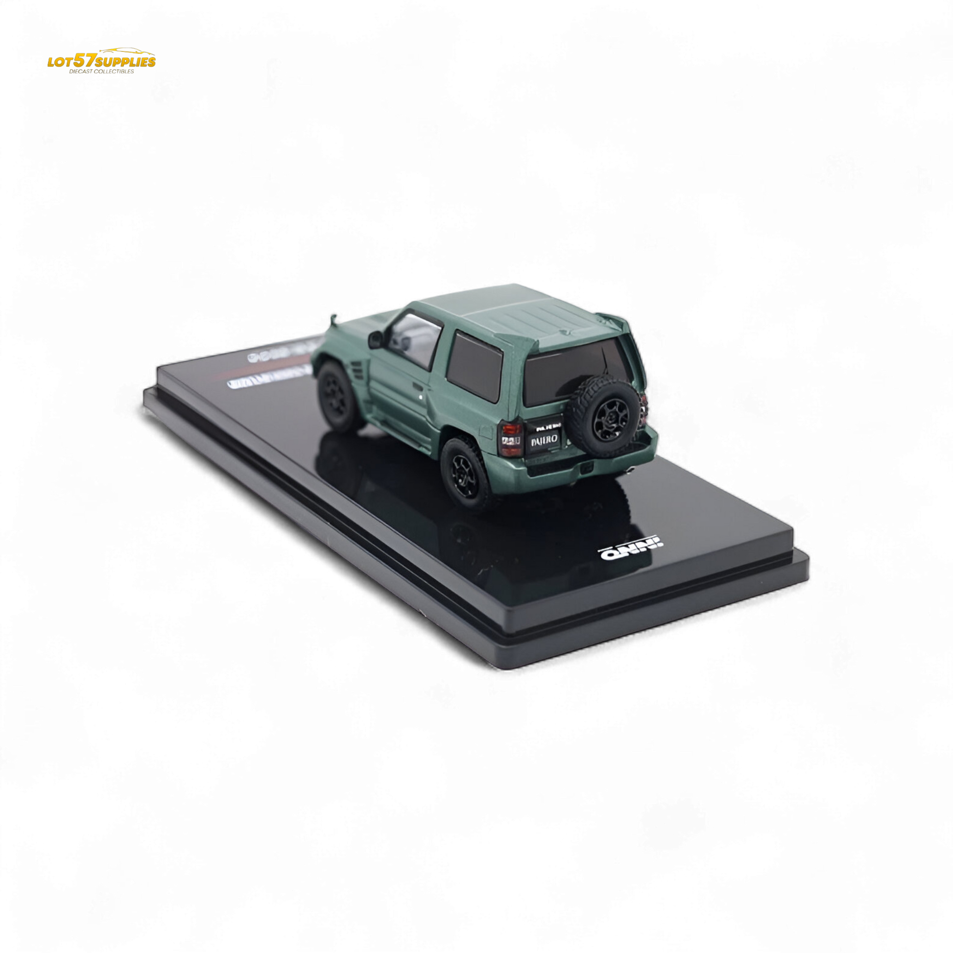 Green Mitsubishi Pajero Evolution diecast model by Inno64, detailed satin finish, 1:64 scale, showcasing its realistic design.