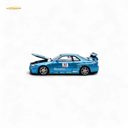 Blue Nissan Skyline R34 diecast model #92 with figure, detailed scale 1:64, from Lot57Supplies Diecast Shop.