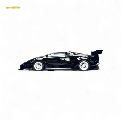 Lamborghini Countach LBWK diecast model with black and white wheels, 1:64 scale, featuring detailed exterior design and vibrant colors.