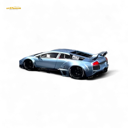 Lamborghini Murcielago LBWK diecast model in ice blue, 1:64 scale, with detailed exterior and Lamborghini branding.