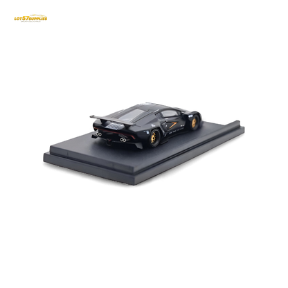 Black Lamborghini Countach diecast model in 1:64 scale by Lot57Supplies Diecast Shop, detailed with sleek design and realistic features.