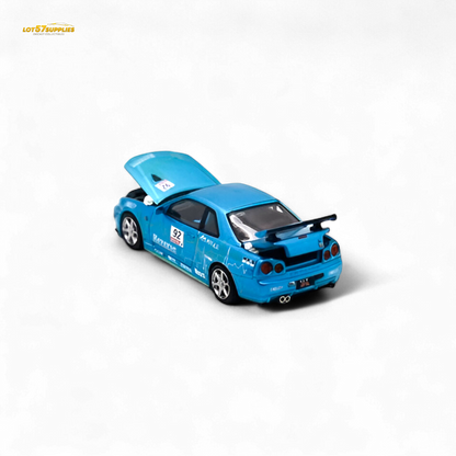 Blue Nissan Skyline R34 diecast car model #92 with figure, 1:64 scale, featuring detailed design from Lot57Supplies Diecast Shop.