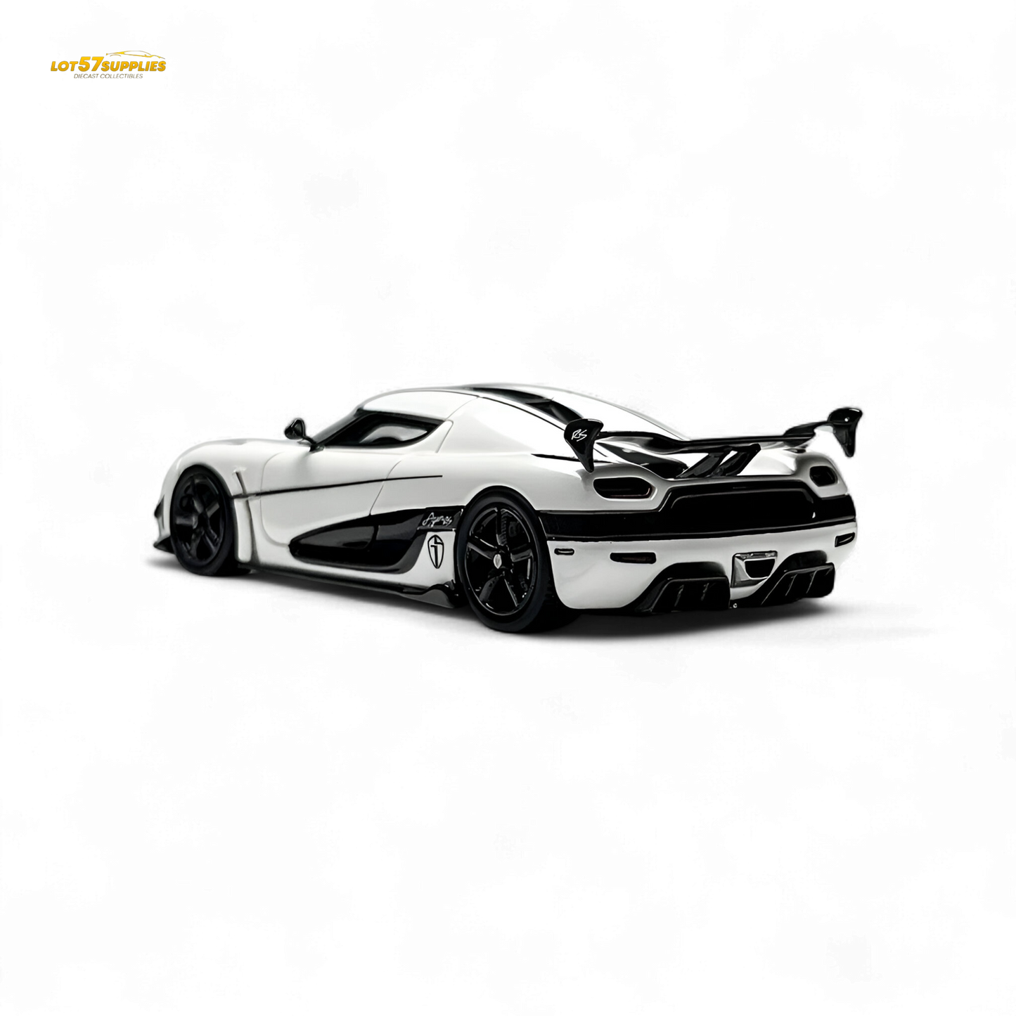 A 1:64 scale Lot57Supplies Diecast Shop Guo Ji Agera RS Panda diecast car model in black and white panda livery.