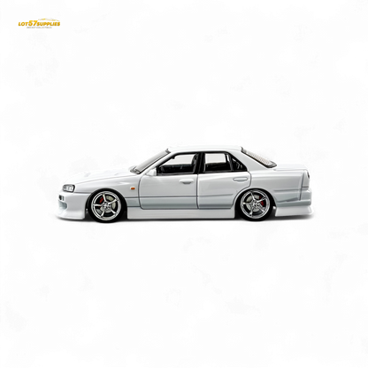 White 1:64 scale Nissan ER34 Skyline diecast model by Lot57Supplies Diecast Shop, detailed Uras edition in pearl white.