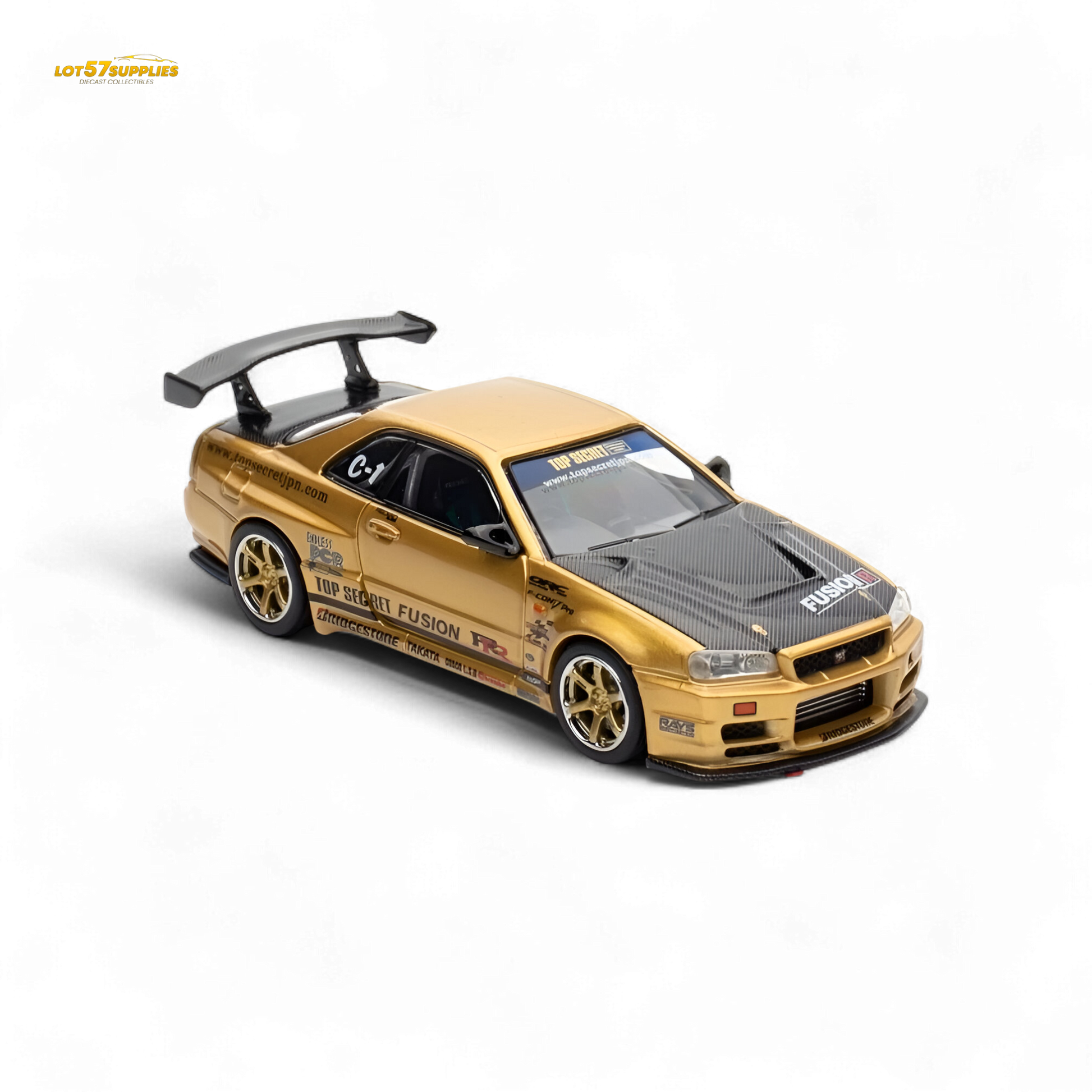 Gold Inno64 Top Secret R34 Nissan GT-R diecast model, 1:64 scale, detailed miniature car with sleek design.