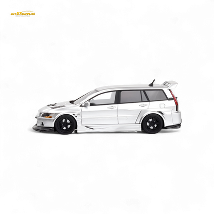 Glossy silver Mitsubishi Lancer EVO 9 Wagon diecast model in 1:64 scale, detailed miniature by Lot57Supplies Diecast Shop.