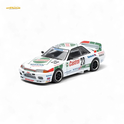 White 1:64 scale Nissan Poprace GT-R R32 Macau Guia Race 1990 winner diecast model car on display