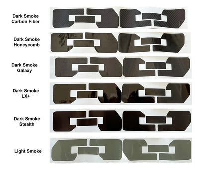 Smoked vinyl front side marker overlays for 2016-2023 Toyota Tacoma by StickerFab, showing the exterior vehicle detail.