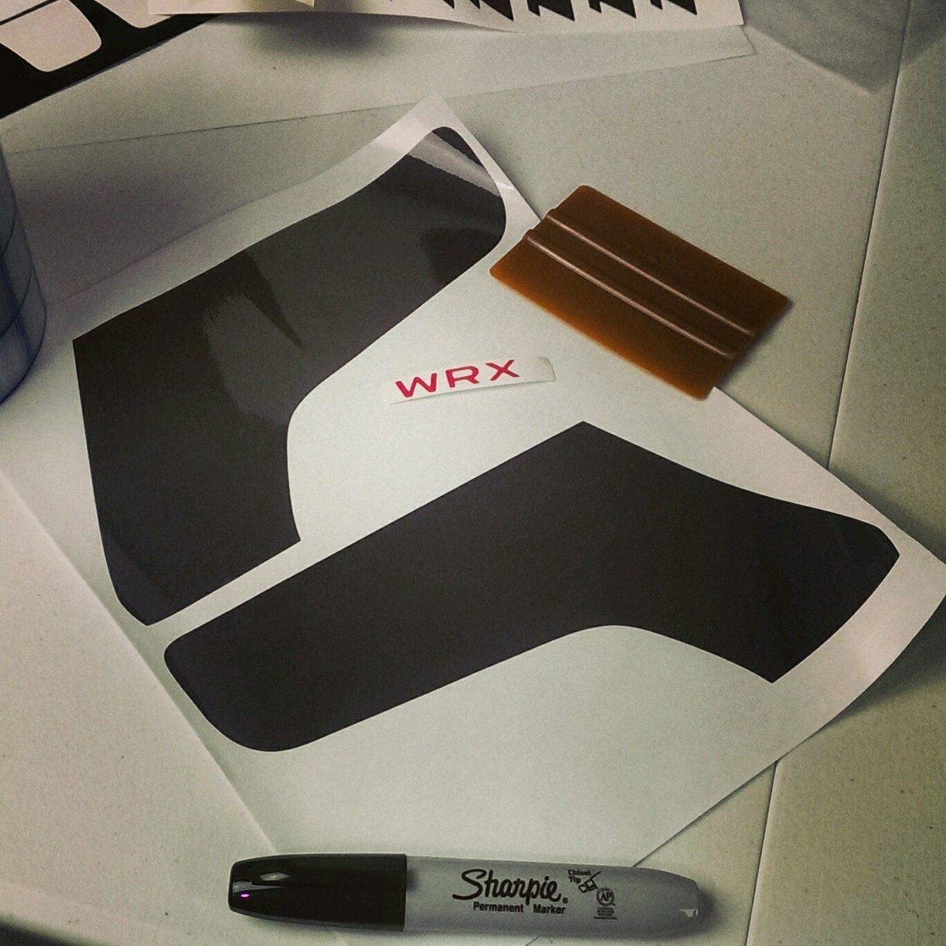 Smoked tail light overlays for 2015-2020 Subaru WRX STI, available in dark, light, red, or yellow, by StickerFab.