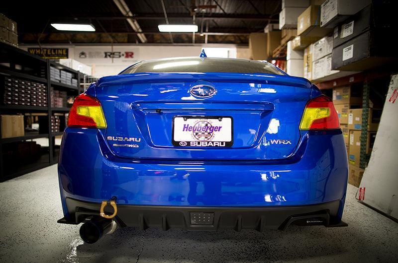 Smoked tail light overlays for 2015-2020 Subaru WRX STI, available in dark, light, red, or yellow, by StickerFab.