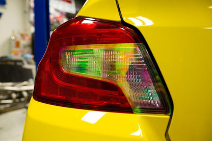 Dark smoked tail light overlays for 2015-2020 Subaru WRX STI, with red, yellow, or light options, by StickerFab.