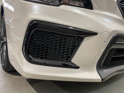 Dark smoke carbon fiber JDM DRL bezel overlays for 2018-2021 Subaru WRX/STI fog lights, by StickerFab.