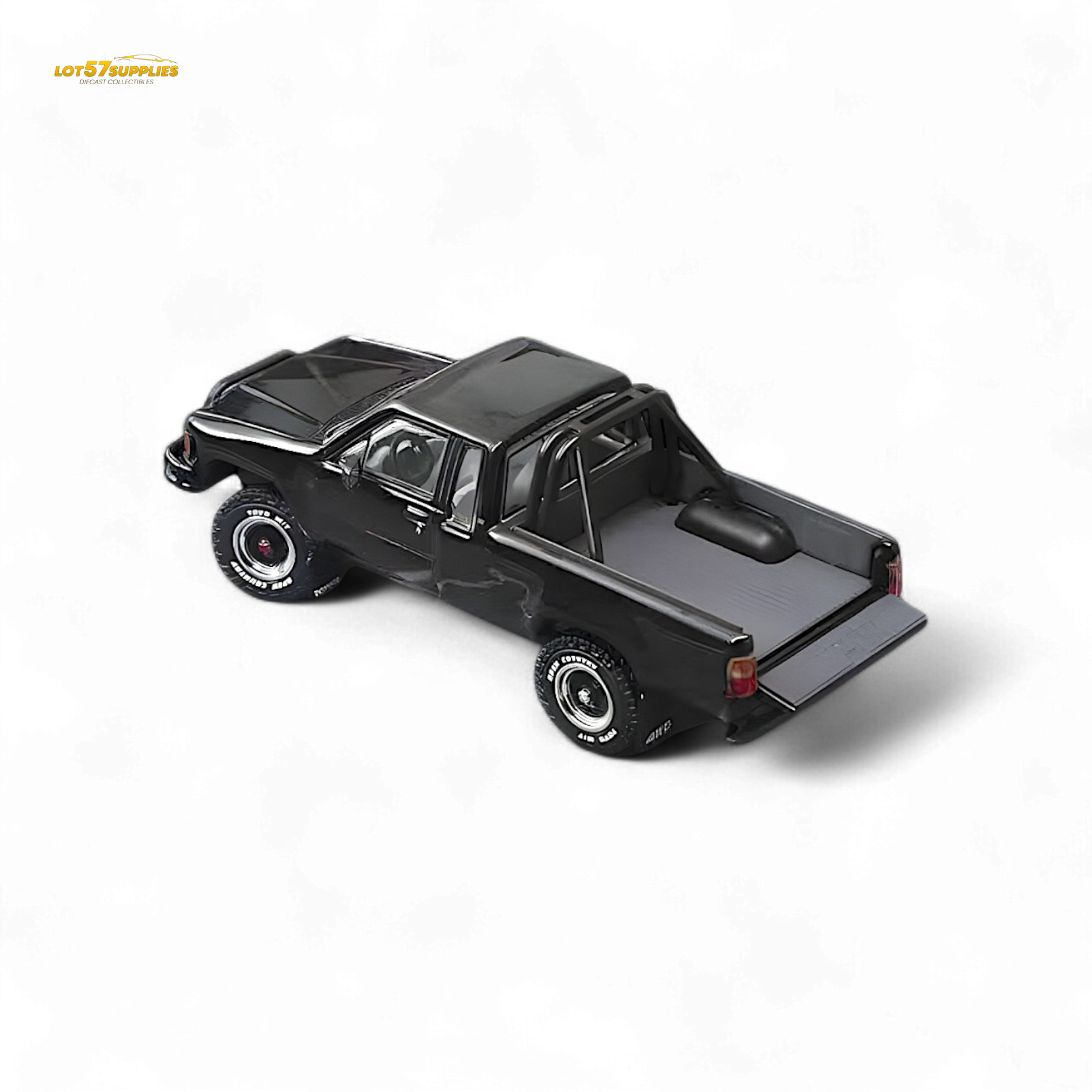 Black Toyota Hilux SR5 diecast model in 1:64 scale by Lot57Supplies Diecast Shop, detailed miniature vehicle with realistic features.