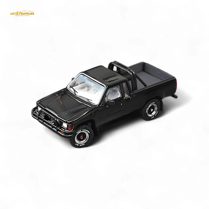 Black Toyota Hilux SR5 diecast model in 1:64 scale by Lot57Supplies Diecast Shop, detailed miniature vehicle, front view.