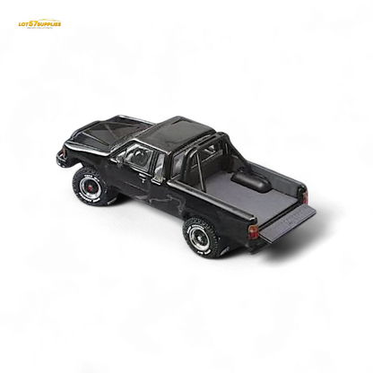 Black Toyota Hilux SR5 diecast model in 1:64 scale by Lot57Supplies Diecast Shop, detailed miniature vehicle for collectors.
