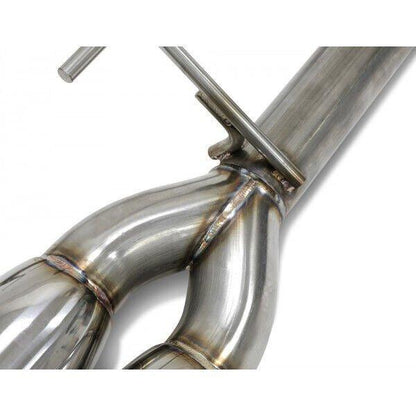 BLOX Racing T304 Muffler Delete installed on a 2015-2021 Subaru WRX/STi, showing the stainless steel exhaust modification.