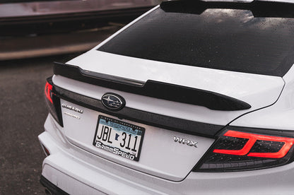 OLM Spec-AR LED taillights with clear lens, black base, and red bar for 2022+ Subaru WRX vehicle tail light upgrade