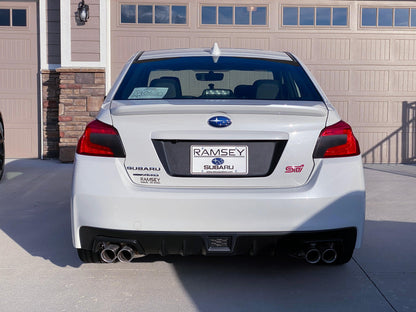StickerFab 3D Carbon license plate panel overlays on a 2015-2020 Subaru WRX STI exterior body, black-out design for a sleek look.