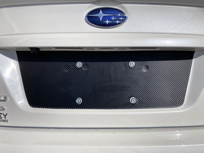 Black out overlay for license plate panel on 2015-2020 Subaru WRX STI, exterior body accessory by StickerFab.