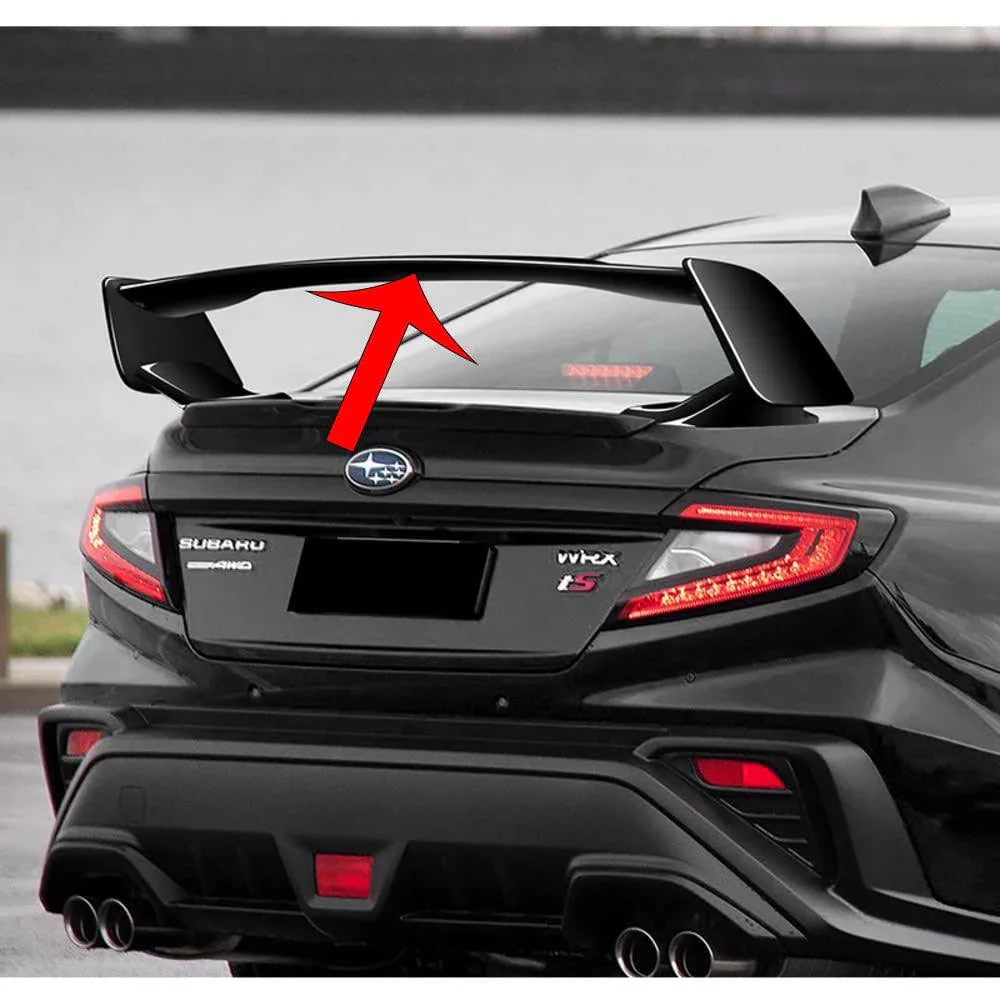 StickerFab Whistle B Gone Kit installed on 2022+ Subaru WRX with aftermarket VA-style STI spoiler, showing the spoiler's sleek design.